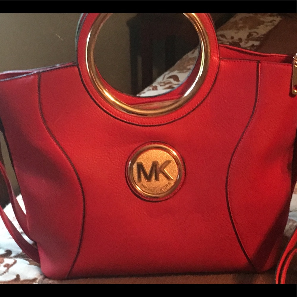 Michael Kors purse is approx 14 x16